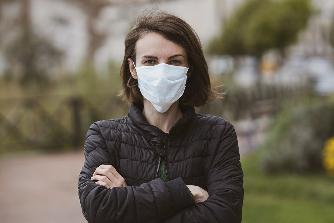 a lady wearing respirator